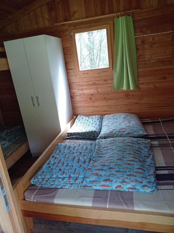 Postel nebo postele na pokoji v ubytování ASTRA Lančov