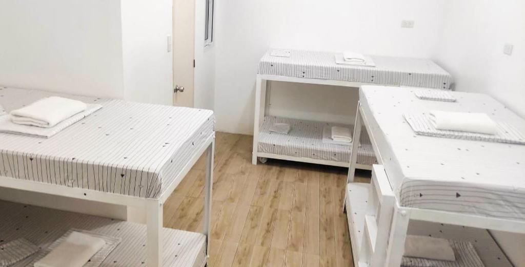 Postel nebo postele na pokoji v ubytování Pasay Centrale Hotel