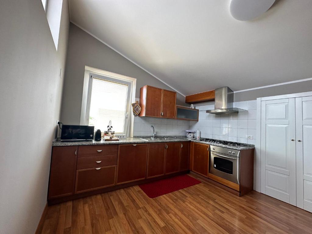 Kuchyň nebo kuchyňský kout v ubytování Casa Olivastri