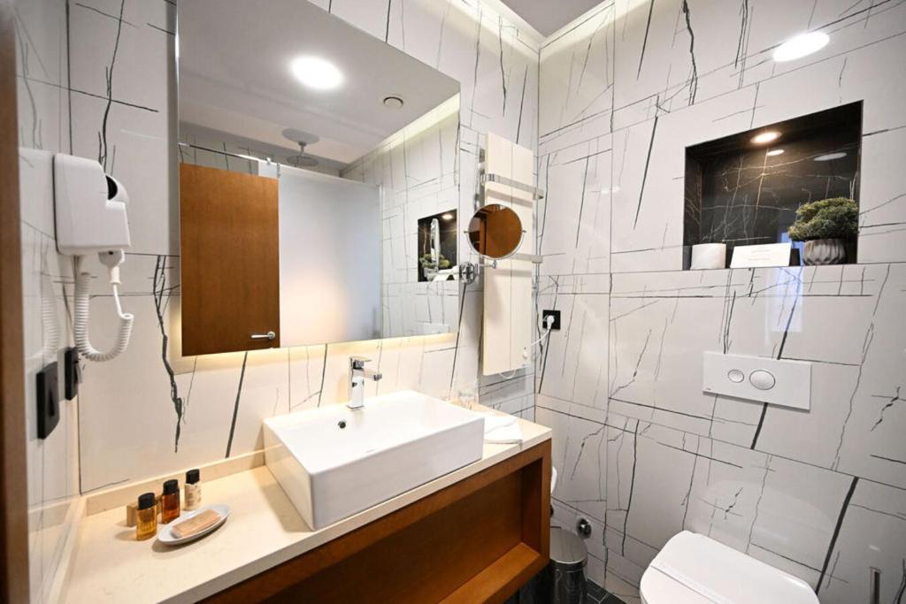 Koupelna v ubytování Hotel Tamiš & Spa