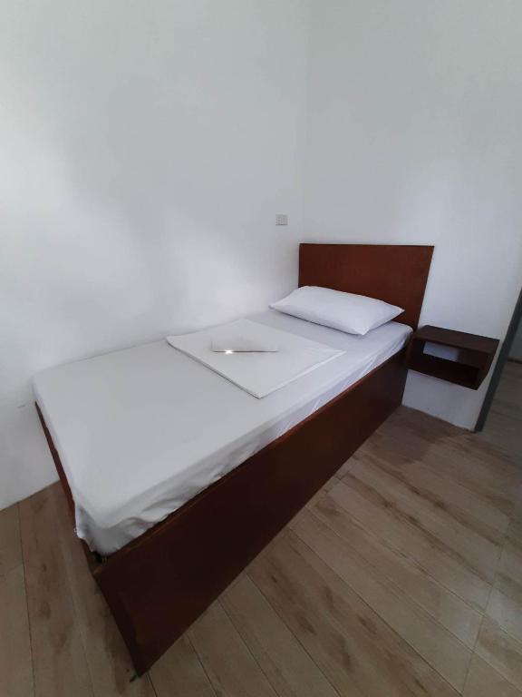 Postel nebo postele na pokoji v ubytování Pasay Centrale Hotel