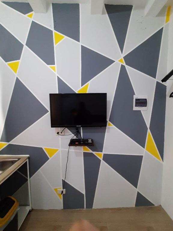 TV a/nebo společenská místnost v ubytování Pasay Centrale Hotel