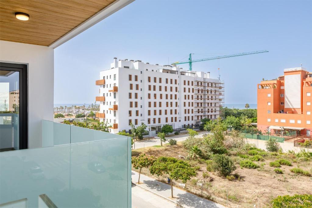 a view from the balcony of a building at A&N Sea View Apartment with Pool & Parking Torre del Mar in Torre del Mar