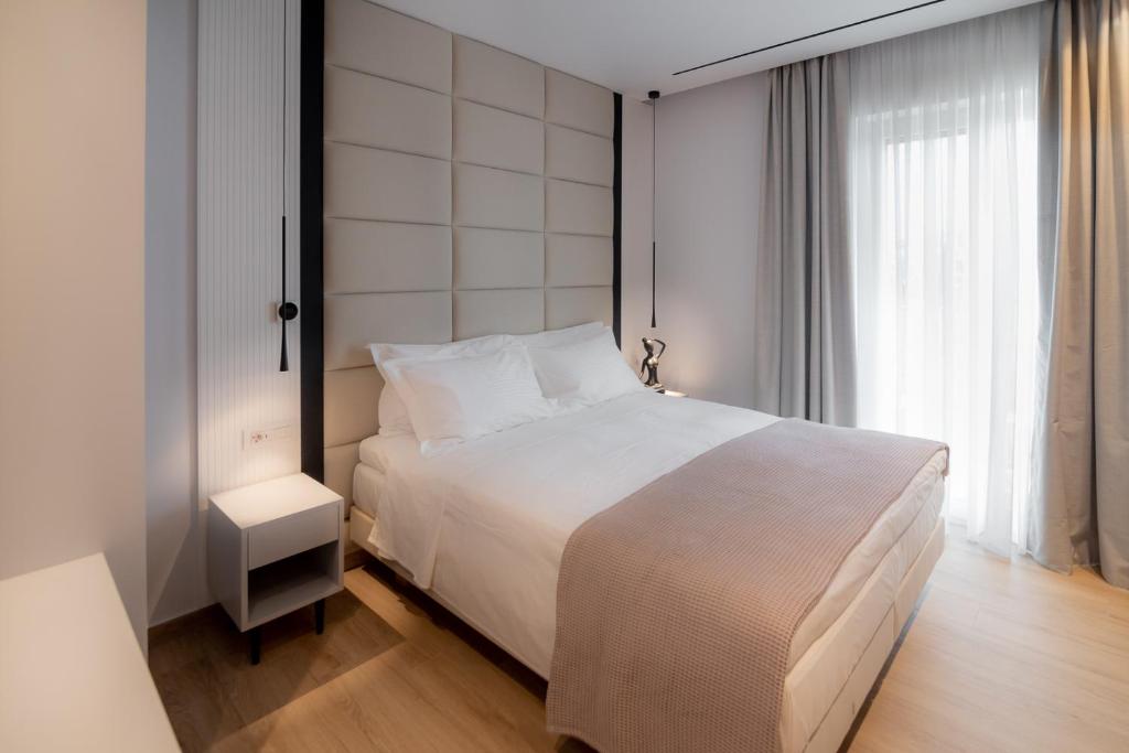 Postel nebo postele na pokoji v ubytování Contessa Bianca Luxury Suites