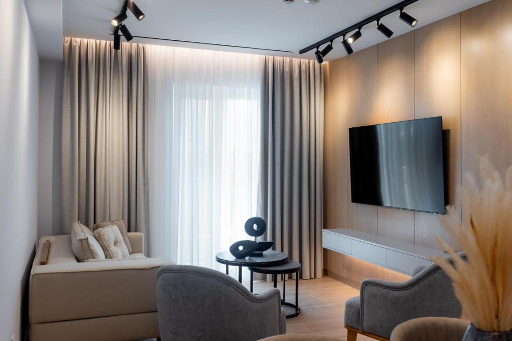 TV a/nebo společenská místnost v ubytování Contessa Bianca Luxury Suites