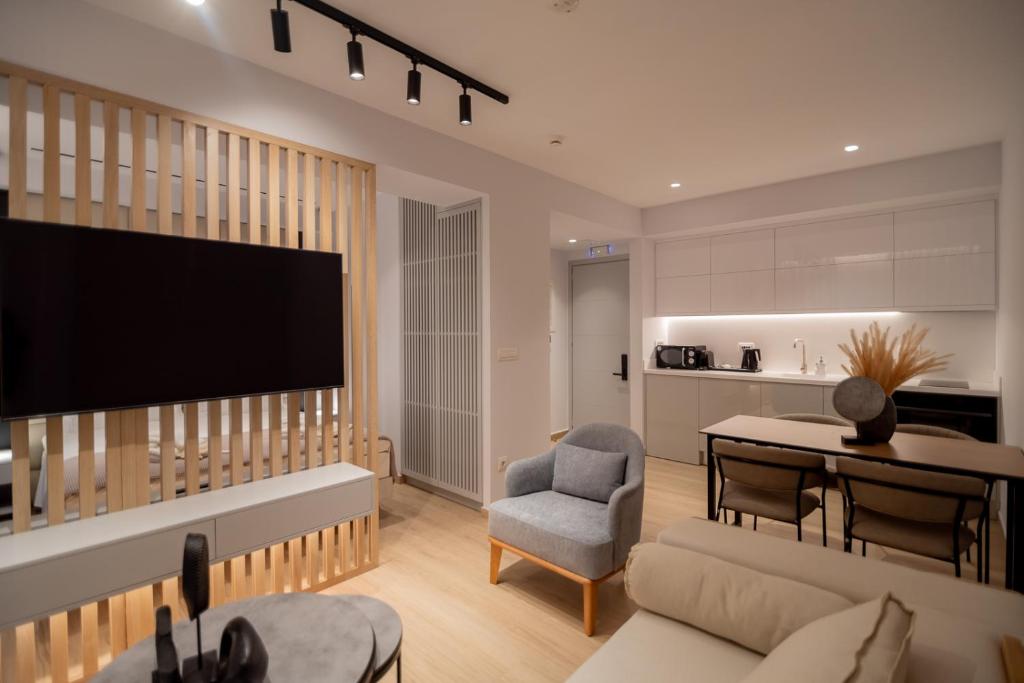 TV a/nebo společenská místnost v ubytování Contessa Bianca Luxury Suites