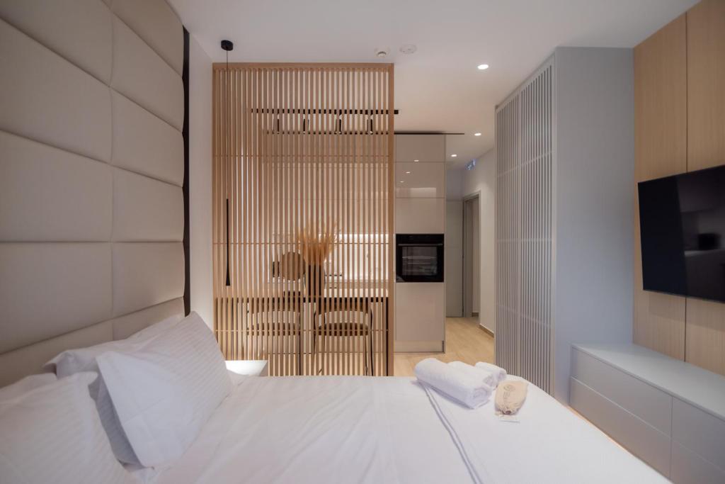 Postel nebo postele na pokoji v ubytování Contessa Bianca Luxury Suites