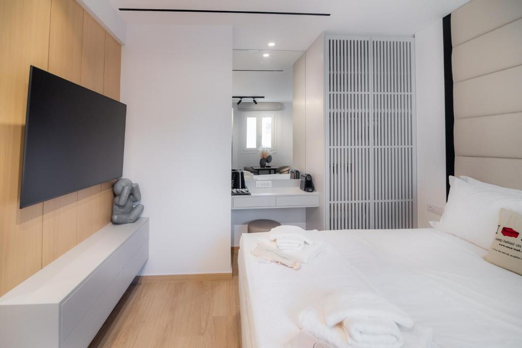 Postel nebo postele na pokoji v ubytování Contessa Bianca Luxury Suites