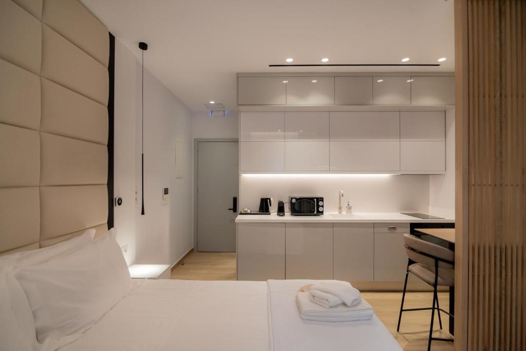 Postel nebo postele na pokoji v ubytování Contessa Bianca Luxury Suites