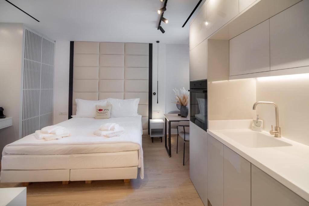 Postel nebo postele na pokoji v ubytování Contessa Bianca Luxury Suites