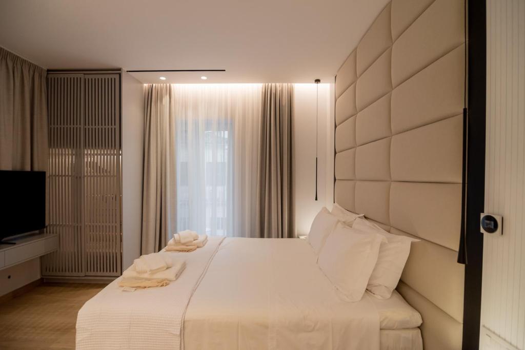 Postel nebo postele na pokoji v ubytování Contessa Bianca Luxury Suites