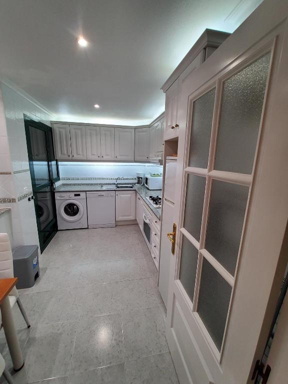 Kuchyň nebo kuchyňský kout v ubytování Superbe appartement calme vue mer