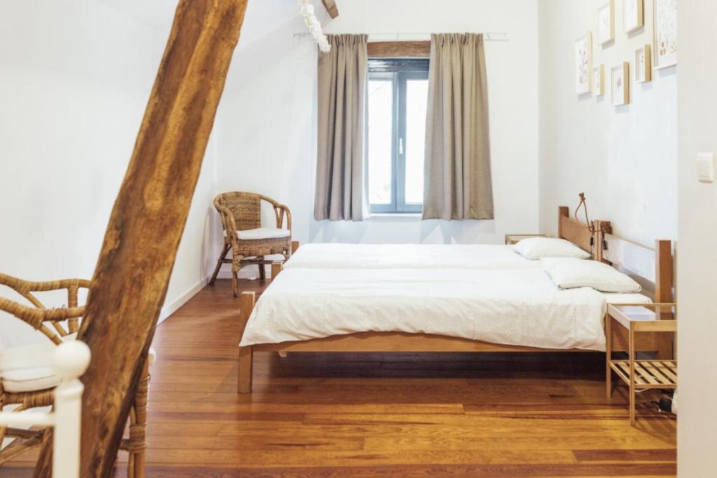 Postel nebo postele na pokoji v ubytování De Zwarte Stok