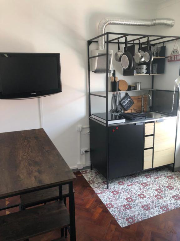 Kuchyň nebo kuchyňský kout v ubytování I Love My Home - apartamento