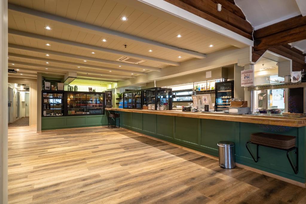 Lounge nebo bar v ubytování Vollan Gjestestue