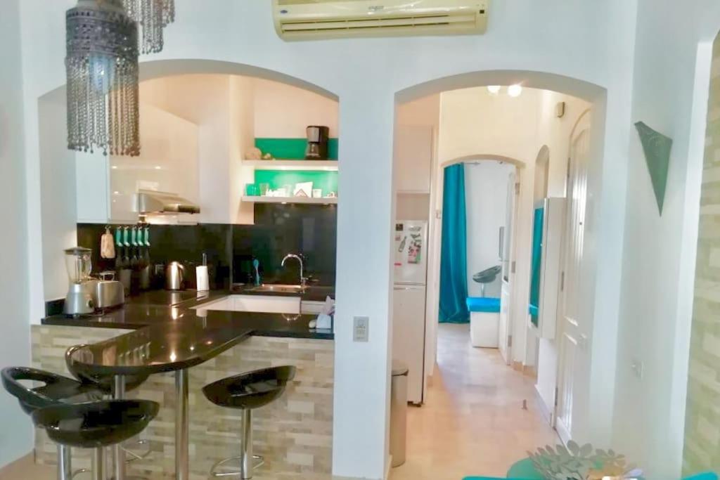 Modern furnished 1-bedroom apartment with pool