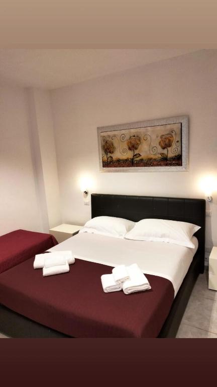 A bed or beds in a room at Residence Palomba