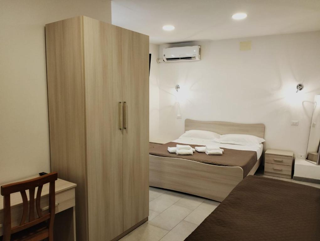 A bed or beds in a room at Residence Palomba