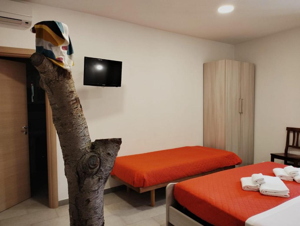 A bed or beds in a room at Residence Palomba