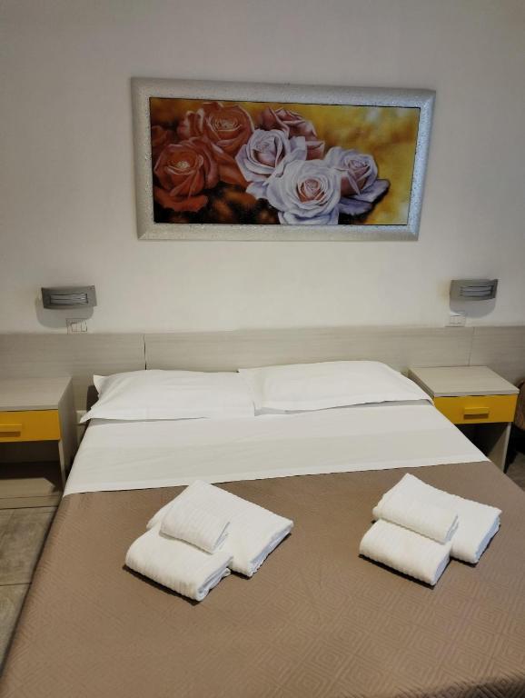 A bed or beds in a room at Residence Palomba