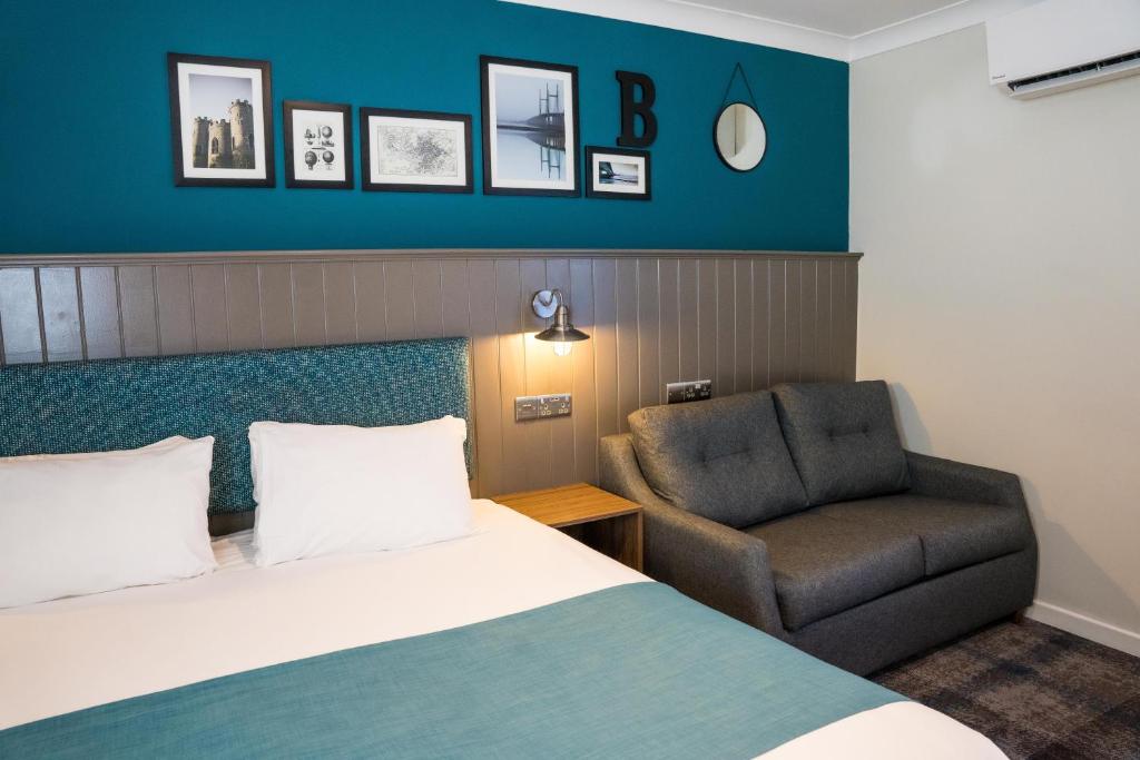 Voodi või voodid majutusasutuse Almondsbury Inn & Lounge toas