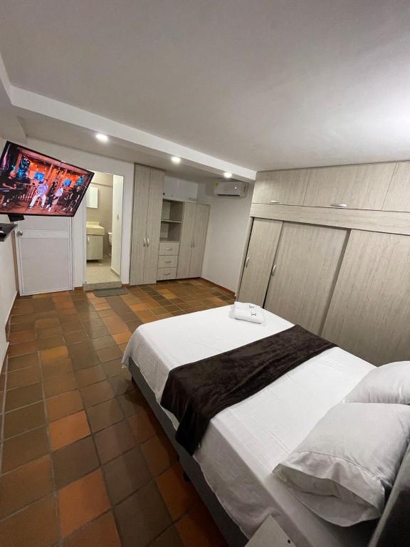 Postel nebo postele na pokoji v ubytování Hotel Valle Central