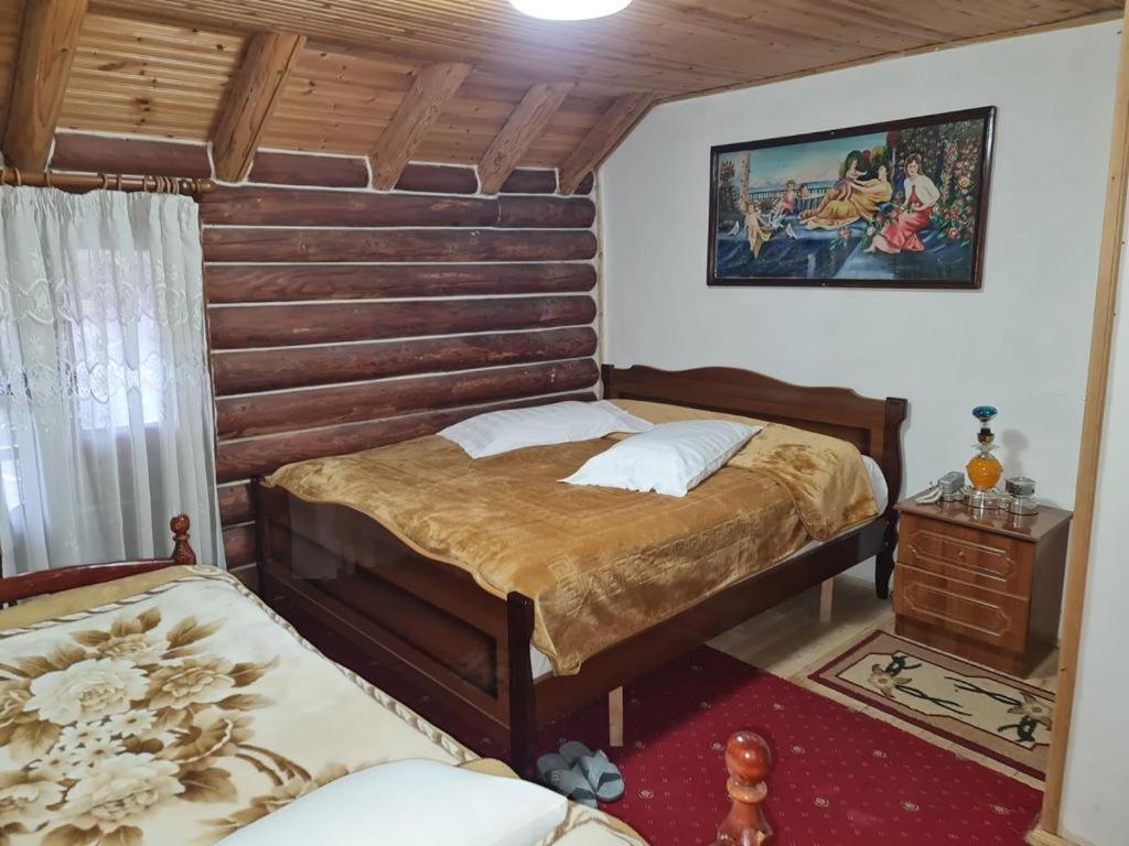 Postel nebo postele na pokoji v ubytování Sofra Kolonjare Agroturizem