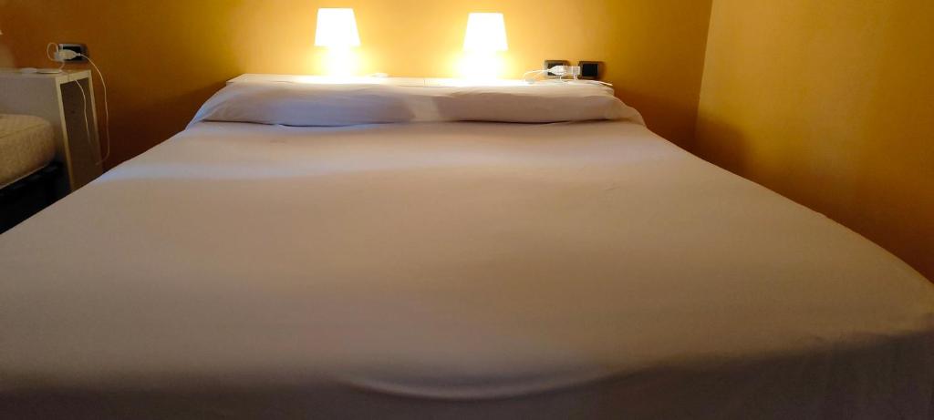 Postel nebo postele na pokoji v ubytování B&B Villa Claudia