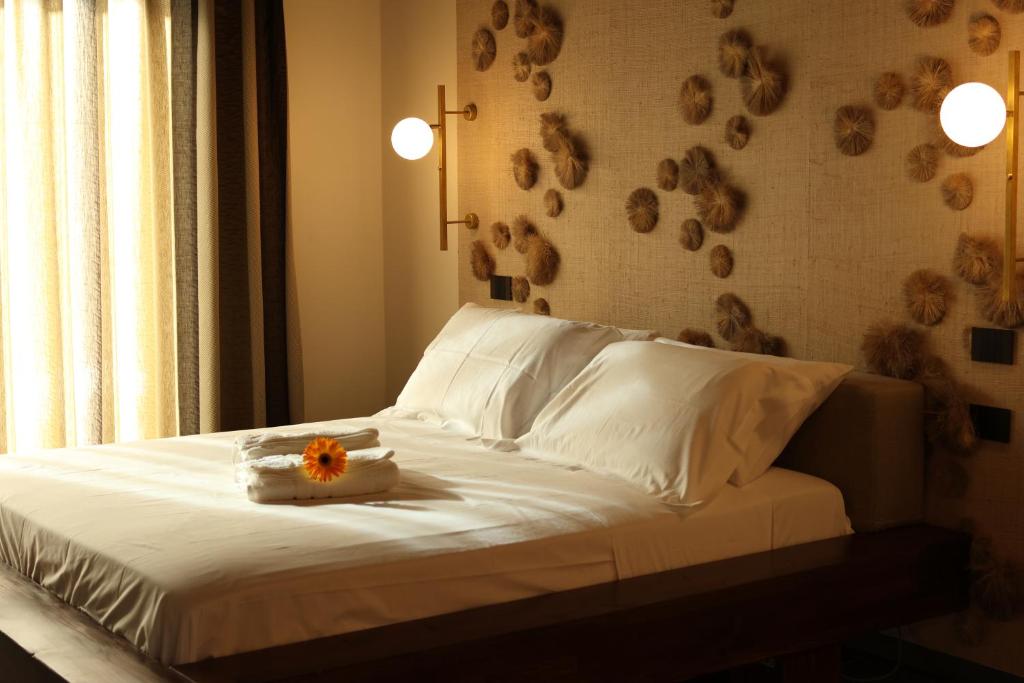 מיטה או מיטות בחדר ב-Tenuta Pezzapane