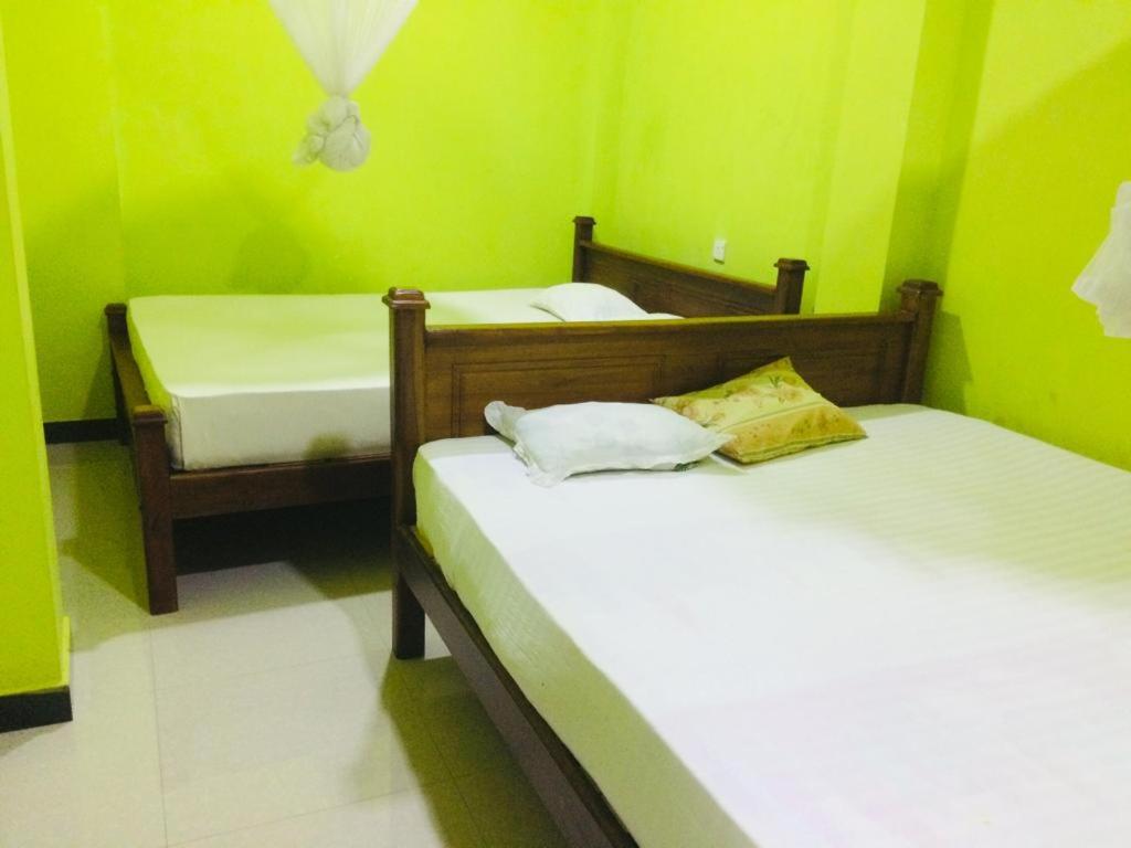 Ambel Homestay - Family Room With Balcony