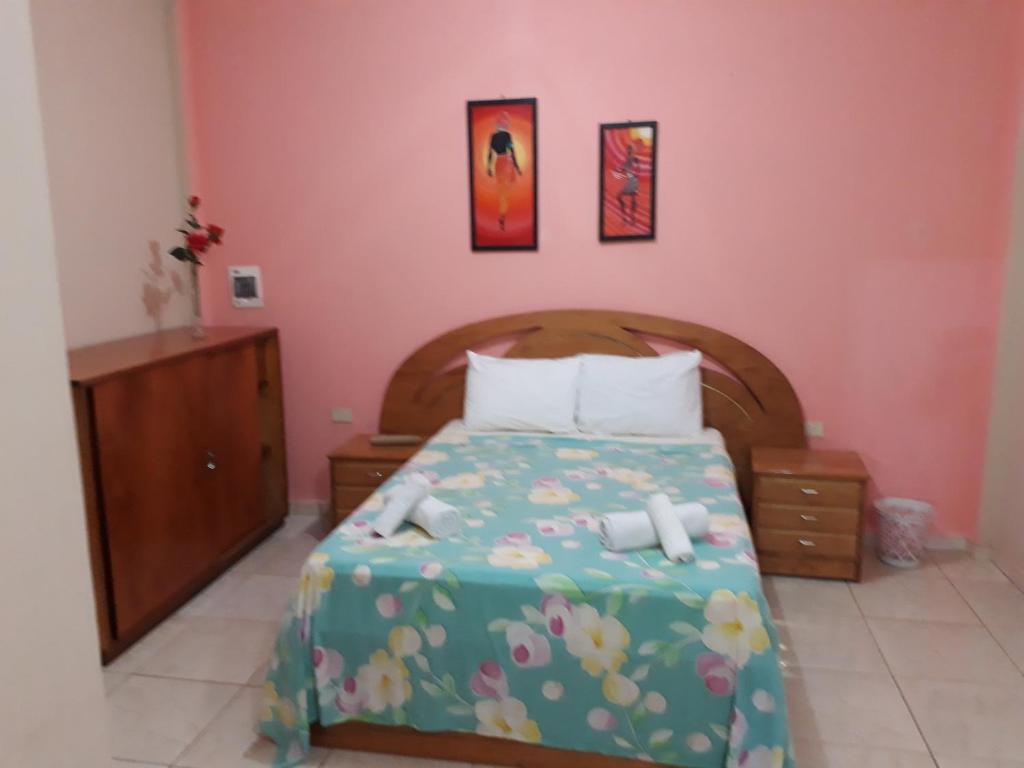 Postel nebo postele na pokoji v ubytování Palmas Park Hotel y Restaurant