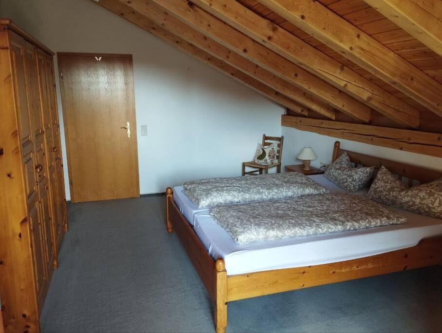 Postel nebo postele na pokoji v ubytování Ferienhaus: idyllisch & erholsam