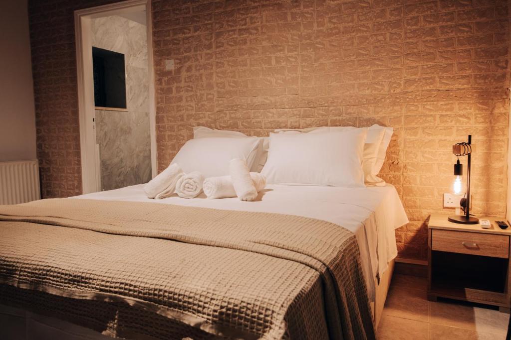Postel nebo postele na pokoji v ubytování Pine View Boutique Hotel Adults Only