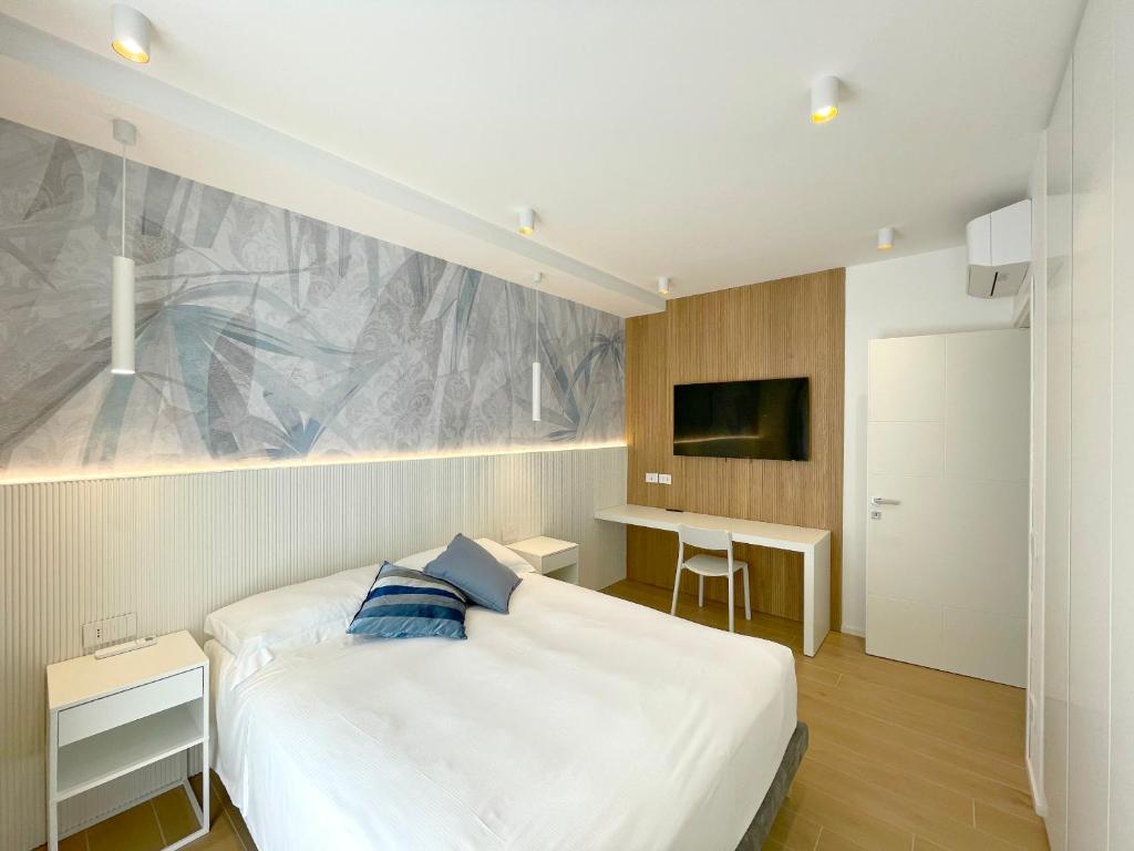 Ένα ή περισσότερα κρεβάτια σε δωμάτιο στο Arcioun Apartments