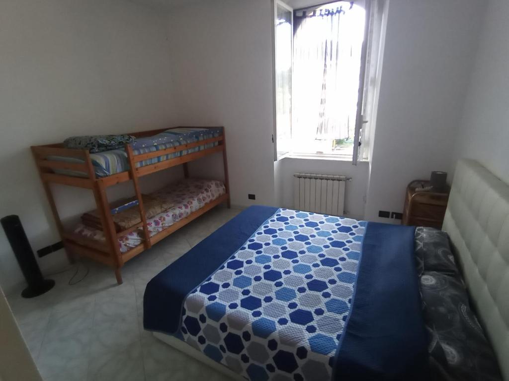 Кровать или кровати в номере Casa Albarosa, 10 min walk train station, free parking.