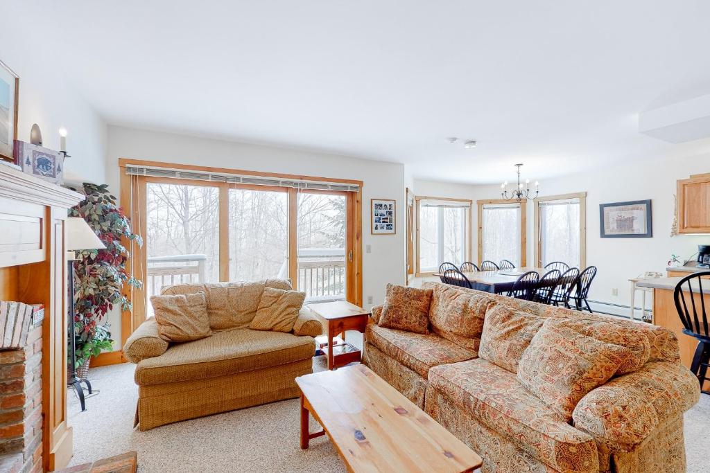 a living room with a couch and a table at Jay Peak Village Home 367A&B in Jay