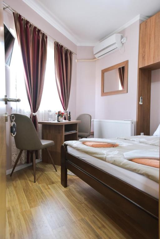 Postel nebo postele na pokoji v ubytování Migro Lux sobe