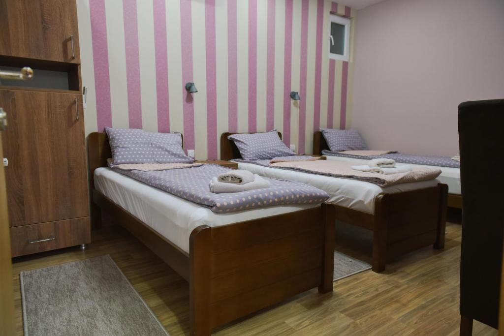 Postel nebo postele na pokoji v ubytování Migro Lux sobe