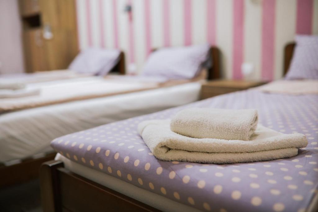 Postel nebo postele na pokoji v ubytování Migro Lux sobe