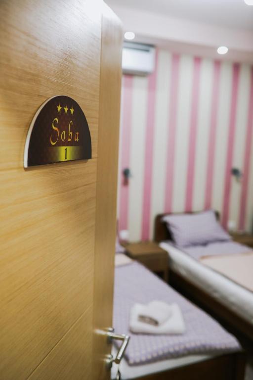 Postel nebo postele na pokoji v ubytování Migro Lux sobe