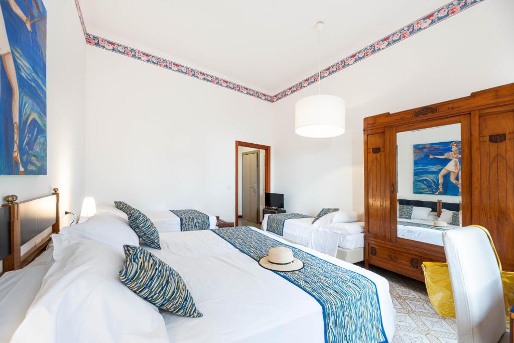 Postel nebo postele na pokoji v ubytování Hotel Rio Sul Mare