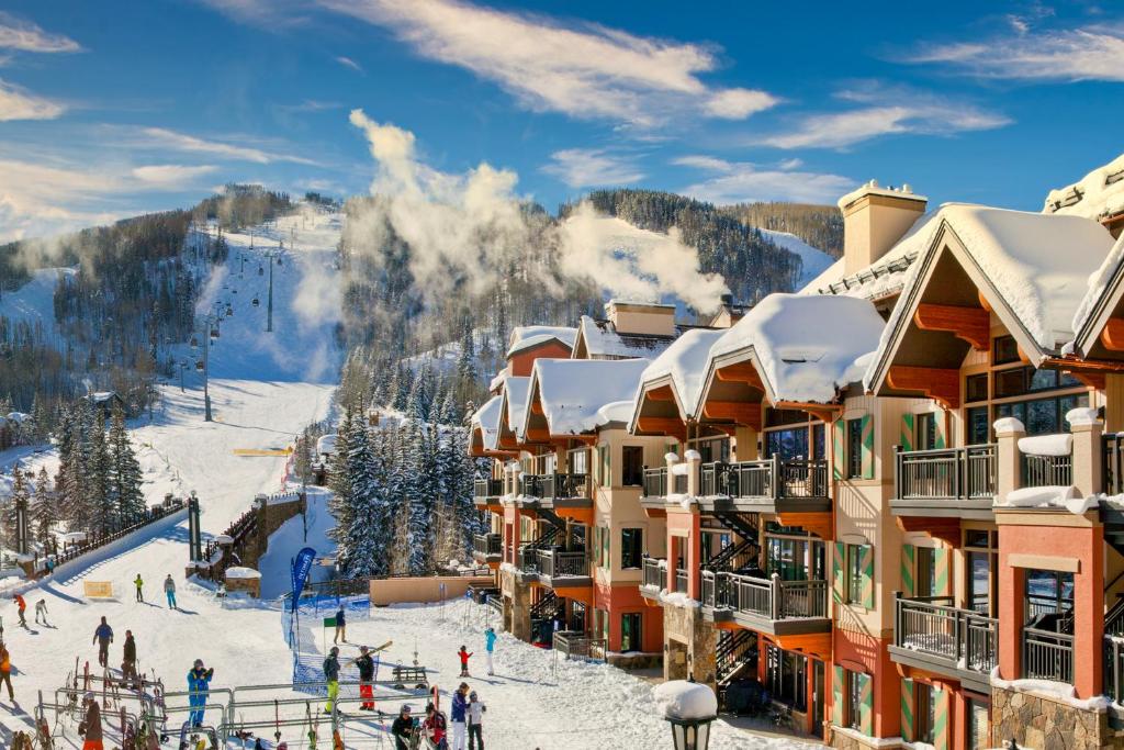 a view of a ski resort with snow covered buildings at Lion Square Lodge South 257 & 261 in Vail