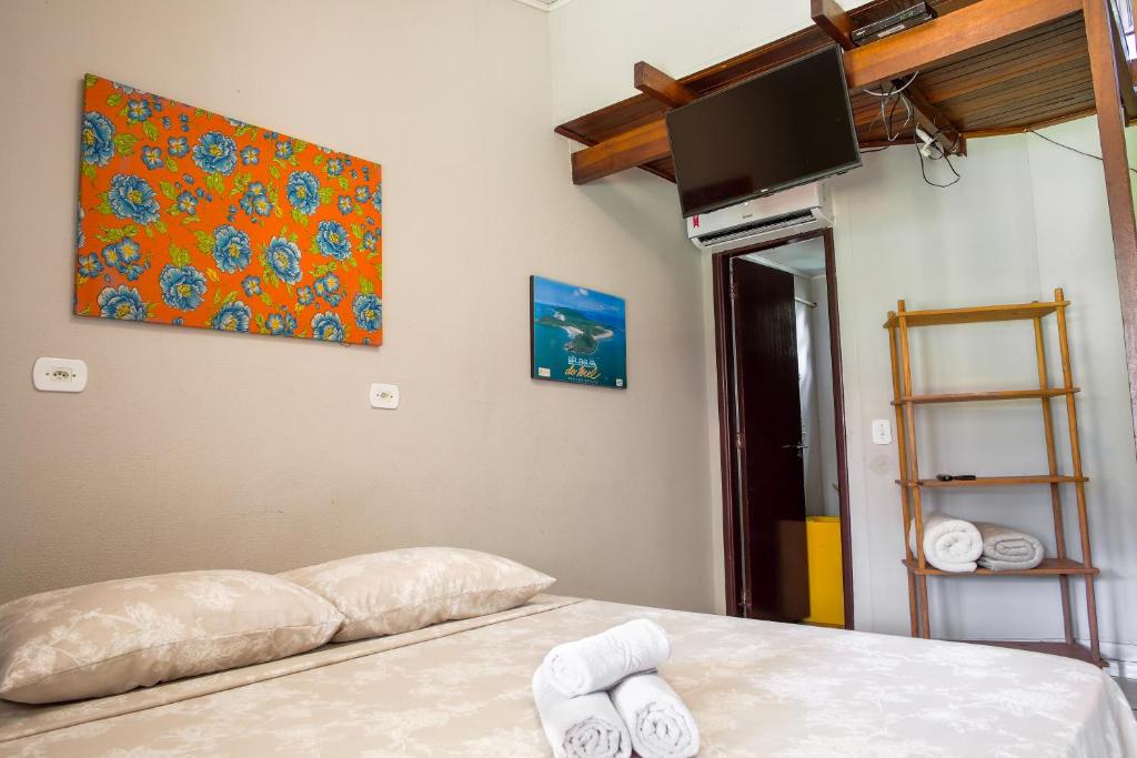 Postel nebo postele na pokoji v ubytování Pousada Plancton