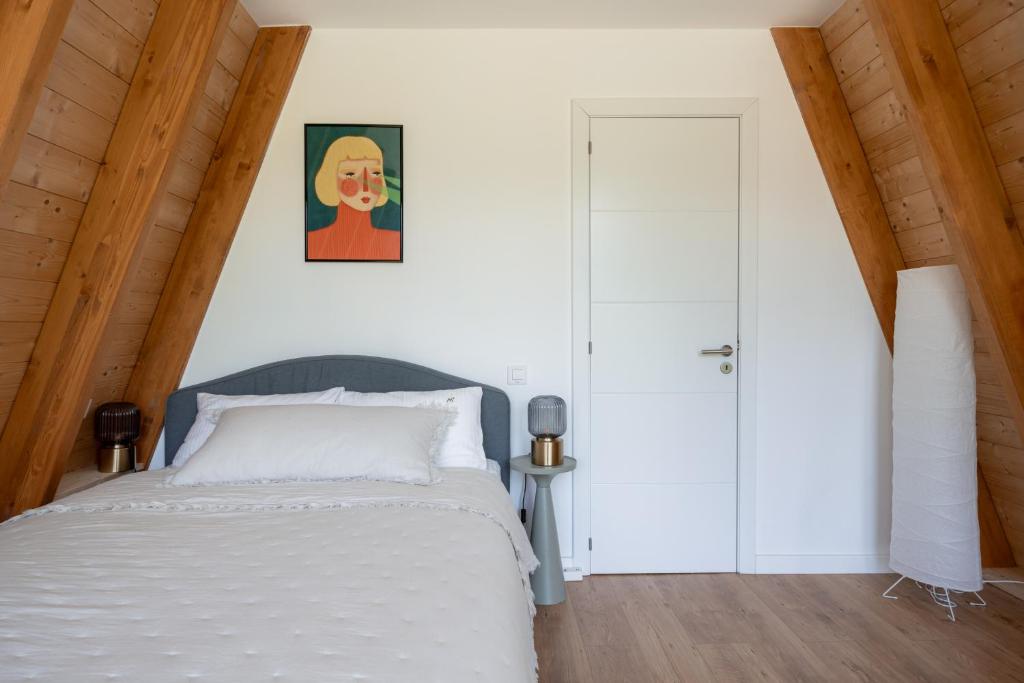 Postel nebo postele na pokoji v ubytování Amont Chalet