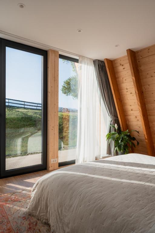 Postel nebo postele na pokoji v ubytování Amont Chalet