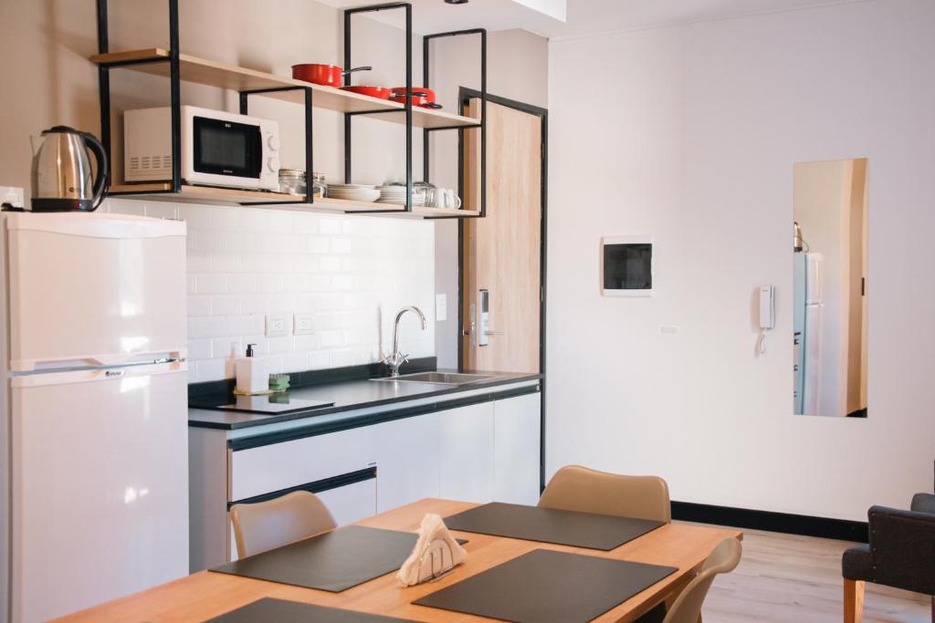 Kuchyň nebo kuchyňský kout v ubytování Distrito A FMA-Coliving
