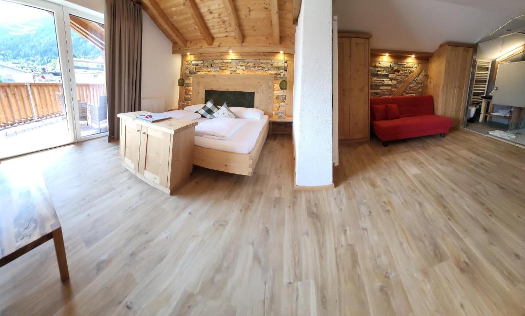 Postel nebo postele na pokoji v ubytování Adler Hotel-Pension