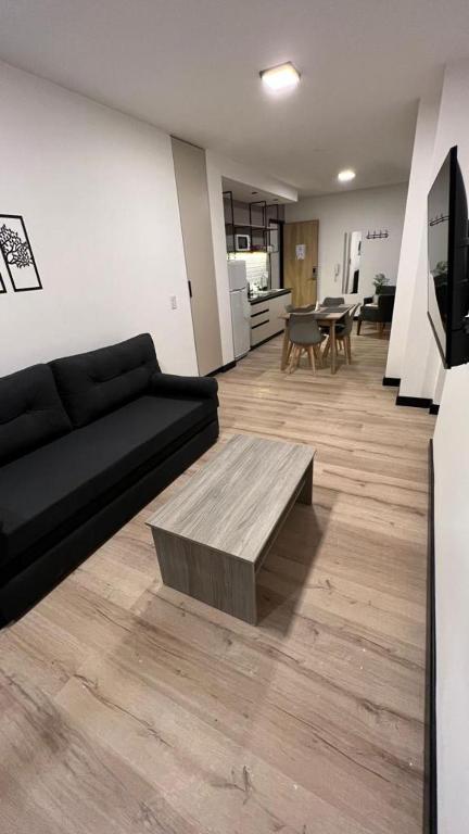 TV a/nebo společenská místnost v ubytování Distrito A FMA-Coliving