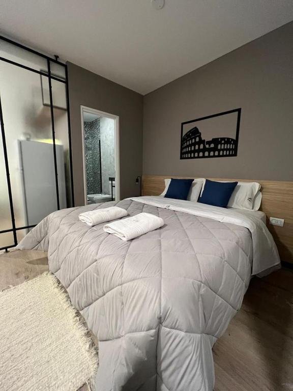 Postel nebo postele na pokoji v ubytování Distrito A FMA-Coliving