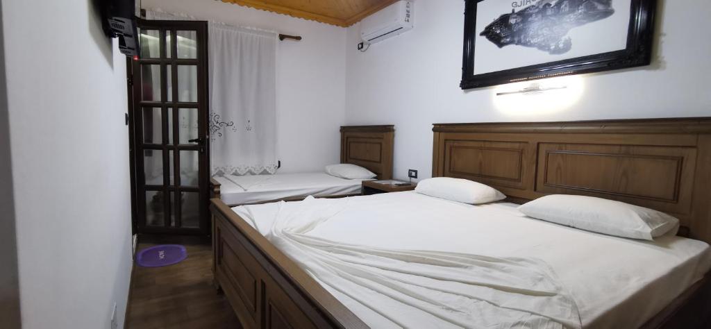 Postel nebo postele na pokoji v ubytování Hazmurat Hotel
